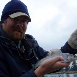 ERIC WITH A GRAYLING FROM THE KENAI RIVER