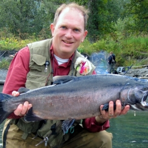 HENRY WITH A BIG BUCK SILVER SALMON